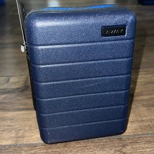 Away Mini Hard Case Luggage Amenity Kit United Airline Sunday Riley Pouch Cord